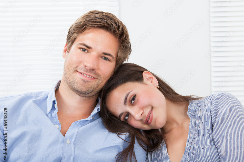 Woman Leaning Head On Man's Shoulder