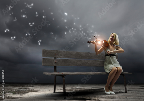 Girl with violin © Sergey Nivens