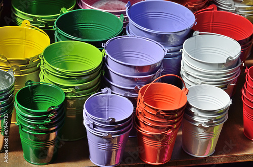 Collection of the varicolored metal buckets