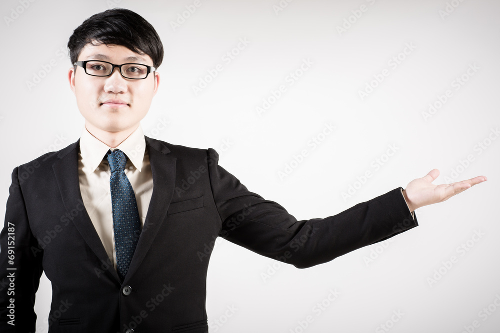 Successful young business man of Asian, full length portrait iso Successful young business man of Asian, full length portrait iso
