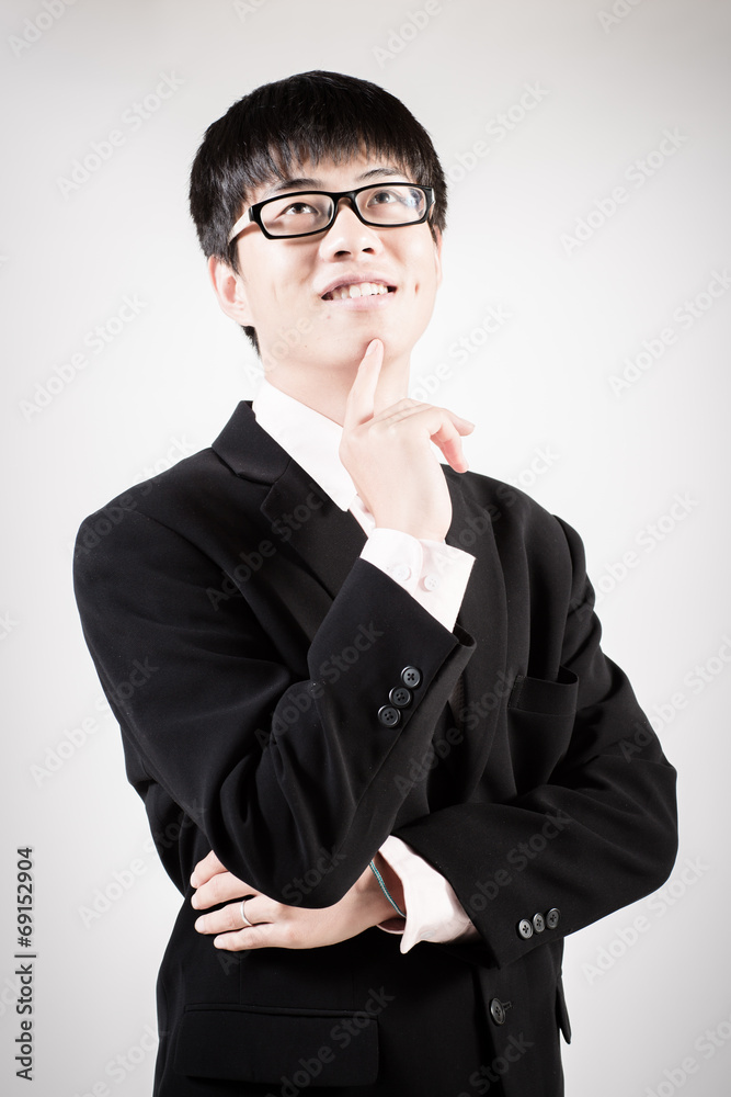 Successful young business man of Asian, full length portrait iso Successful young business man of Asian, full length portrait iso