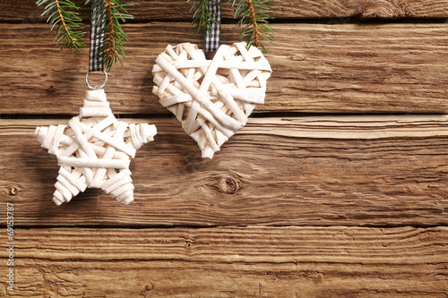 Two rustic straw Christmas ornaments photo