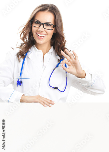 Doctor showing blank signboard, isolated