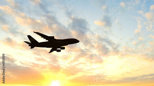 Airplane Take Off Silhouette in the sunset