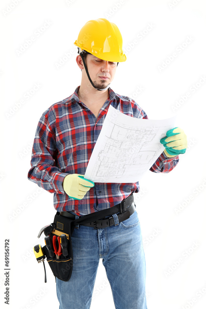 Contractor Examines Blueprint Contractor Examines Blueprint