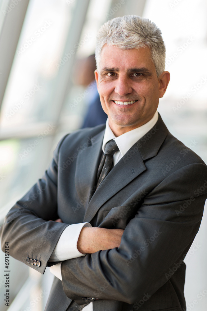 senior businessman with arms crossed senior businessman with arms crossed