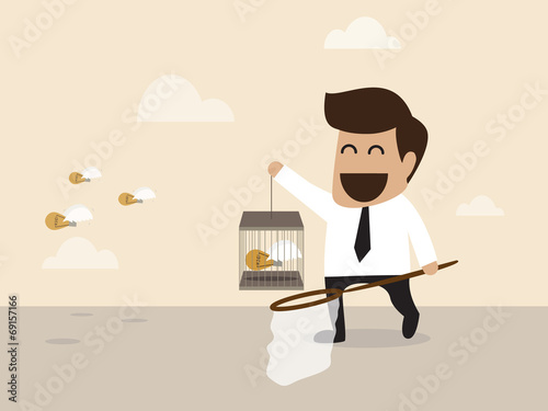 Idea lightbulb is captured by businessman
