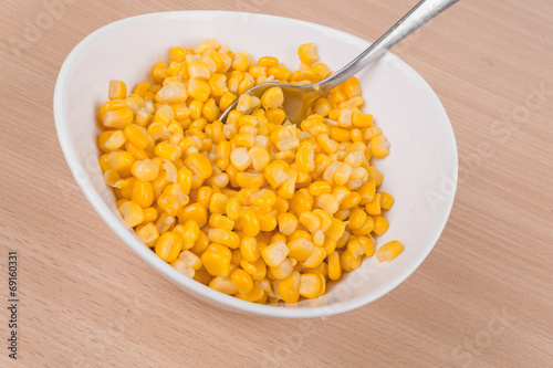 yellow corn in a bowl on the table