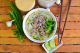 Vietnamese pho on wood table. Pho is a vietnamese traditional