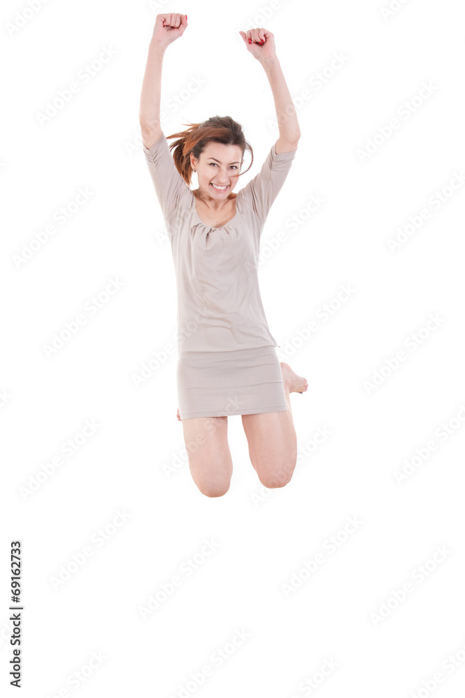 Attractive young woman having fun jumping in the air barefoot Attractive young woman having fun jumping in the air barefoot