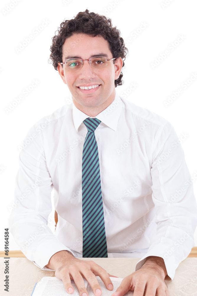 Happy business man wearing tie smiling reading book Happy business man wearing tie smiling reading book