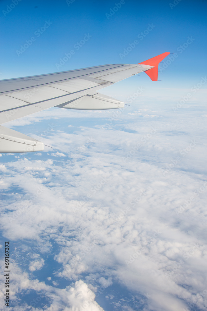 Airplane wing out of window Airplane wing out of window