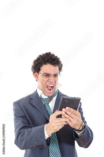 upset, pissed off and tired man in suit uses tablet for work or © feelphotoartzm