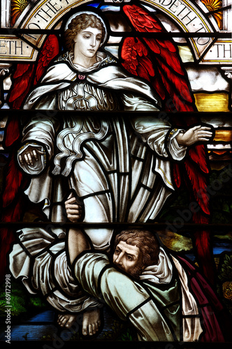 Jacob wrestling with the angel of the Lord (stained glass) photo