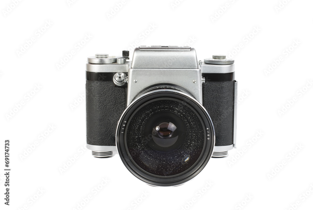 Old mechanical 50mm photo camera isolated on white background