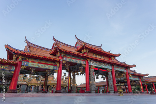 Red gateway of chinese temple  with blue sky