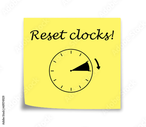 Sticky note reminder to set clocks forward