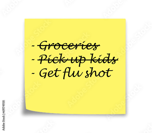 Sticky note reminder to get flu shot