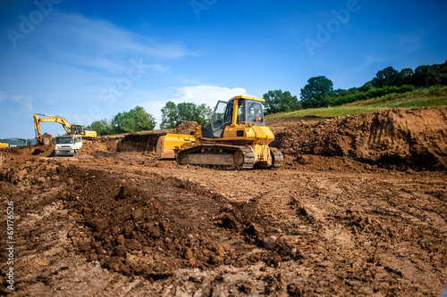 industrial machinery at working construction building site
