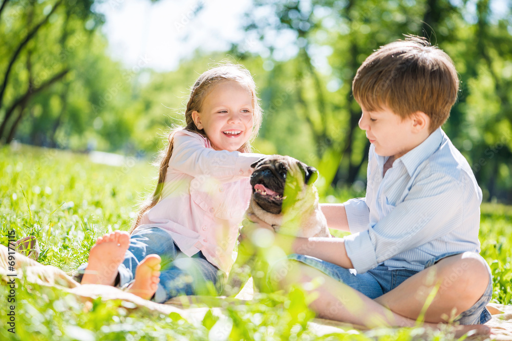 Children in park with pet Children in park with pet