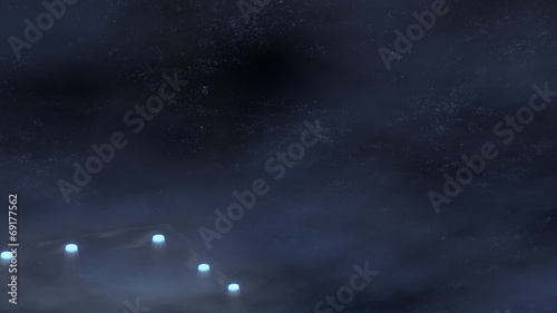 triangular ufo at night in the clouds
