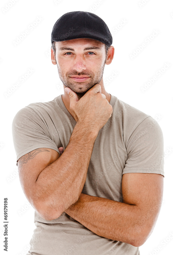 Smiling young man with arms crossed. Smiling young man with arms crossed.