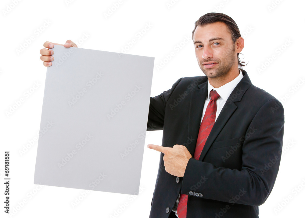 Smiling young business man holding a placard Smiling young business man holding a placard