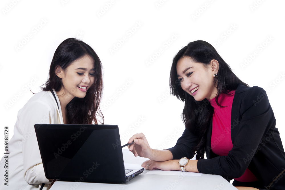 Two businesswomen discussing job 1 Two businesswomen discussing job 1