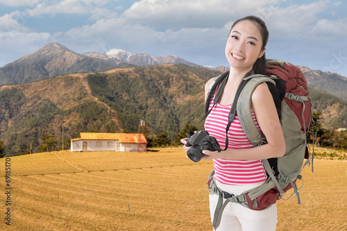 backpacker with camera photo