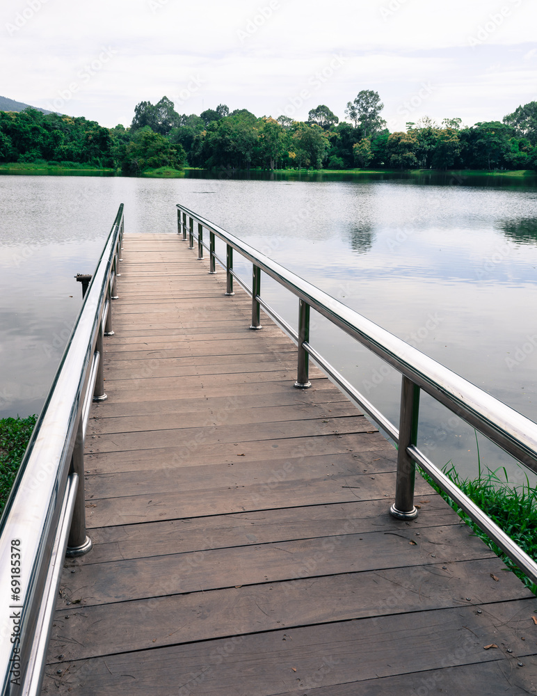 stainless steel bridge or pier at lake stainless steel bridge or pier at lake
