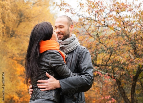 Happy middle-aged couple outdoors on an autumn day © Nejron Photo