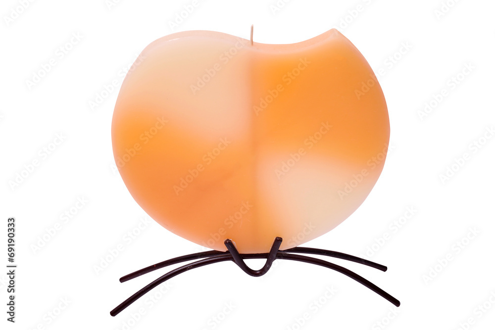 Obraz premium Orange candle on white background