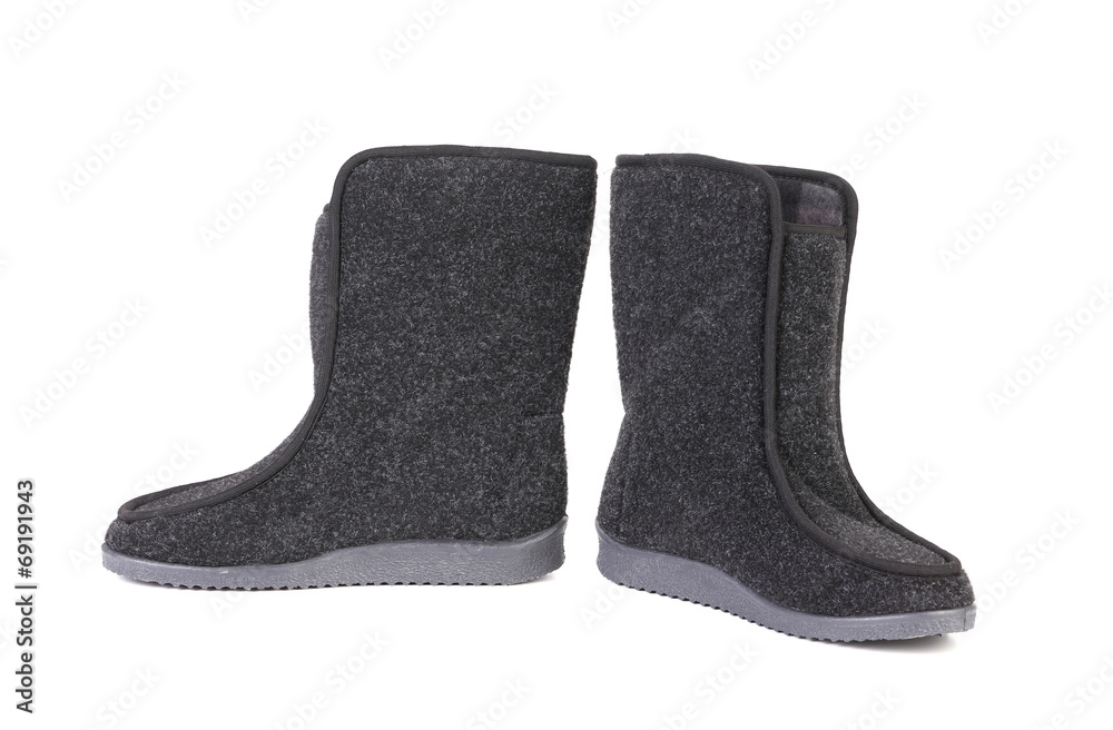 Pair of black felt boots. Pair of black felt boots.
