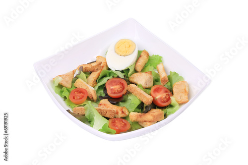 Caesar salad with eggs.