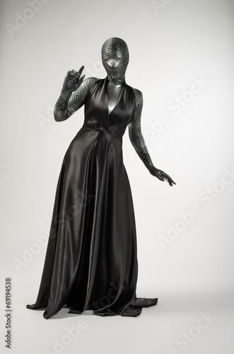 Woman wrapped in black robes