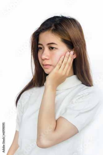 Asian woman with a toothache .
