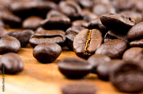 Coffee on wooden background Fresh coffee beans on wood ,ready to