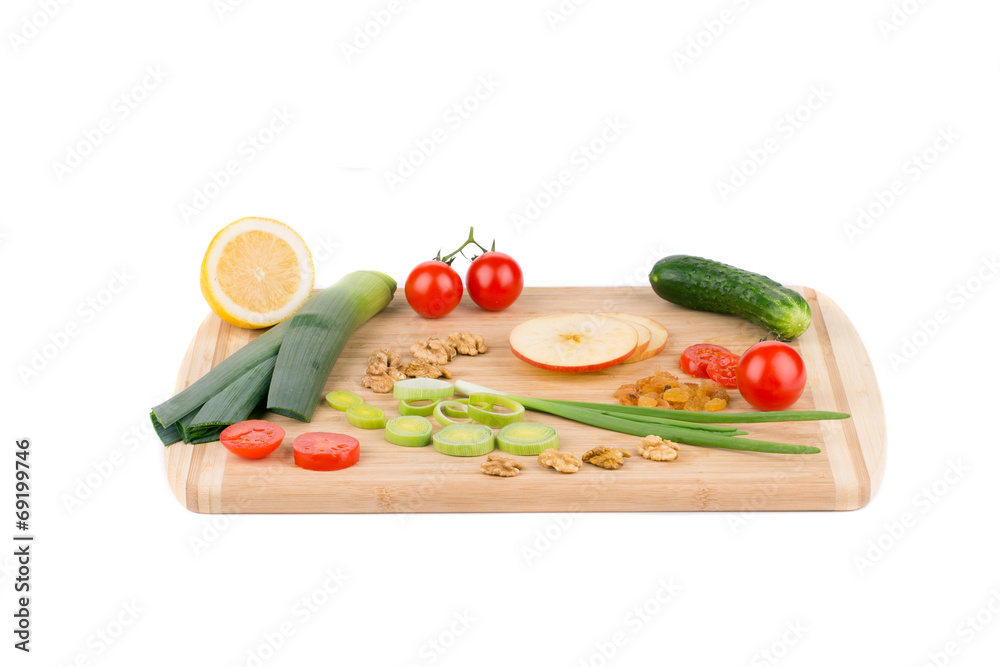 Vegetables on wooden platter. Vegetables on wooden platter.