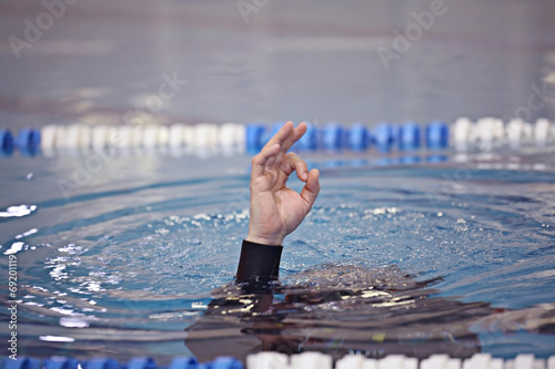 diving command hand on the water surface