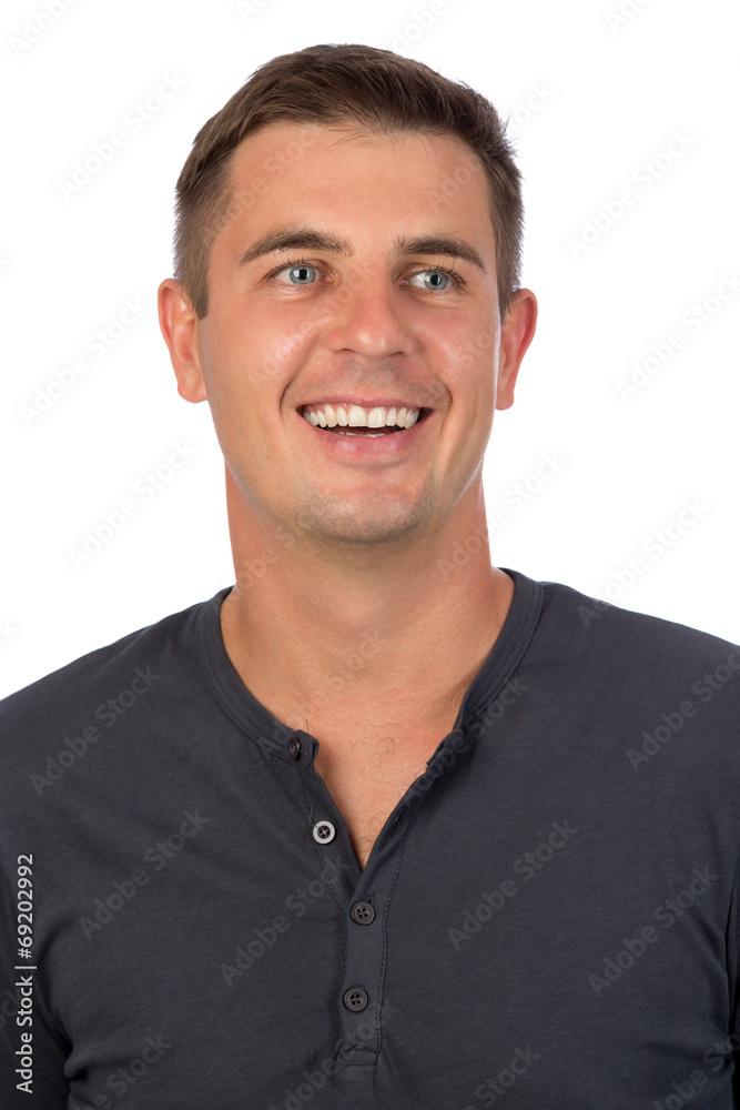 Portrait of a young smiling man close up Portrait of a young smiling man close up