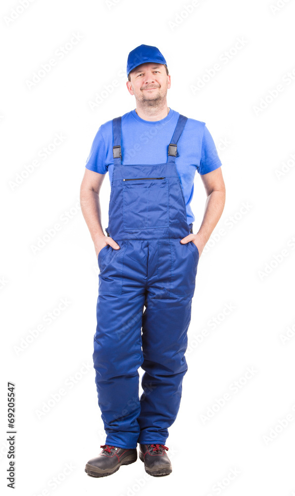 Worker in blue overalls. Worker in blue overalls.