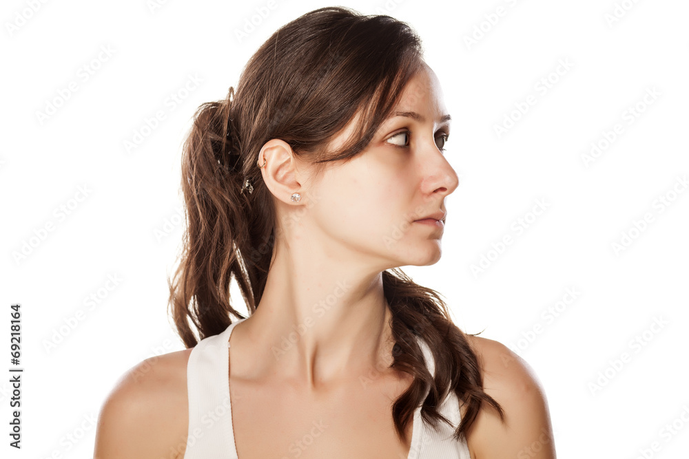 profiile of serious young woman without make-up profiile of serious young woman without make-up