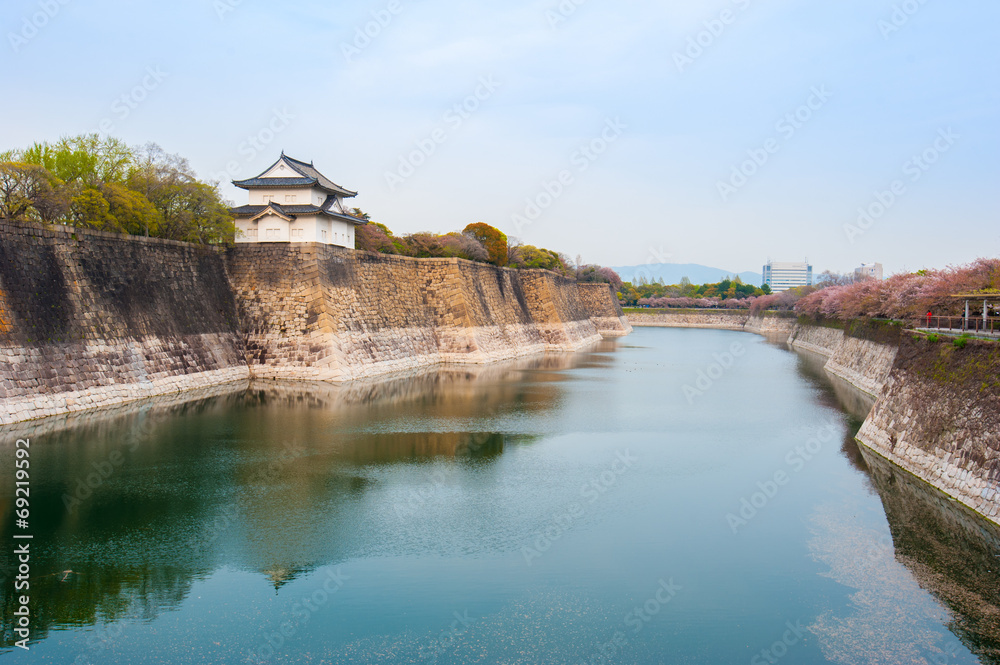 Canal and wall of osaka castle in osaka, Japan