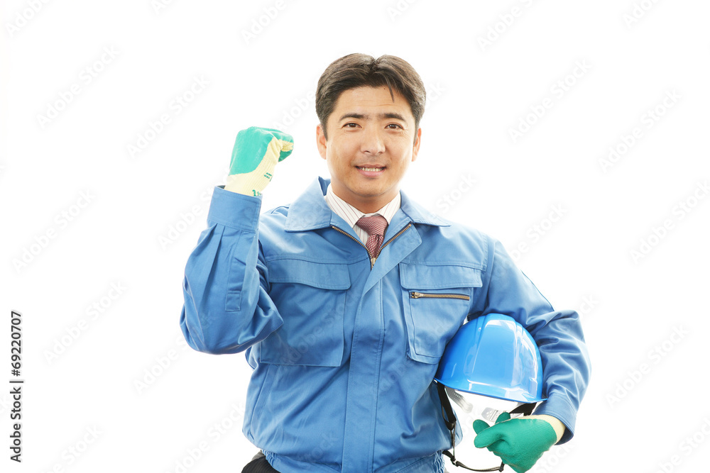 ガッツポーズの労働者