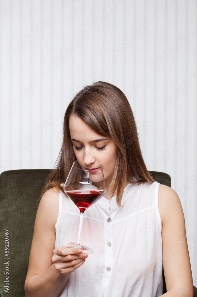 Beautiful girl drinking wine