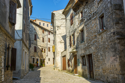 Fototapeta Naklejka Na Ścianę i Meble -  Old and narrow street in Bale town, Istria, Croatia