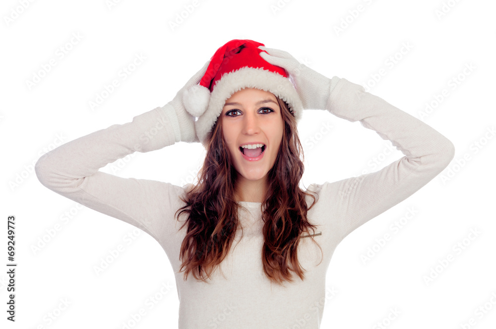 Surprised casual girl with Christmas hat Surprised casual girl with Christmas hat