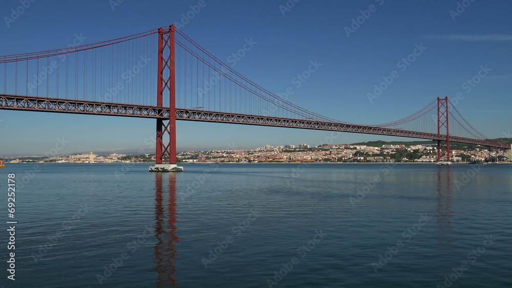 View on the 25 de Abril Bridge in Lisbon, Portugal. View on the 25 de Abril Bridge in Lisbon, Portugal.
