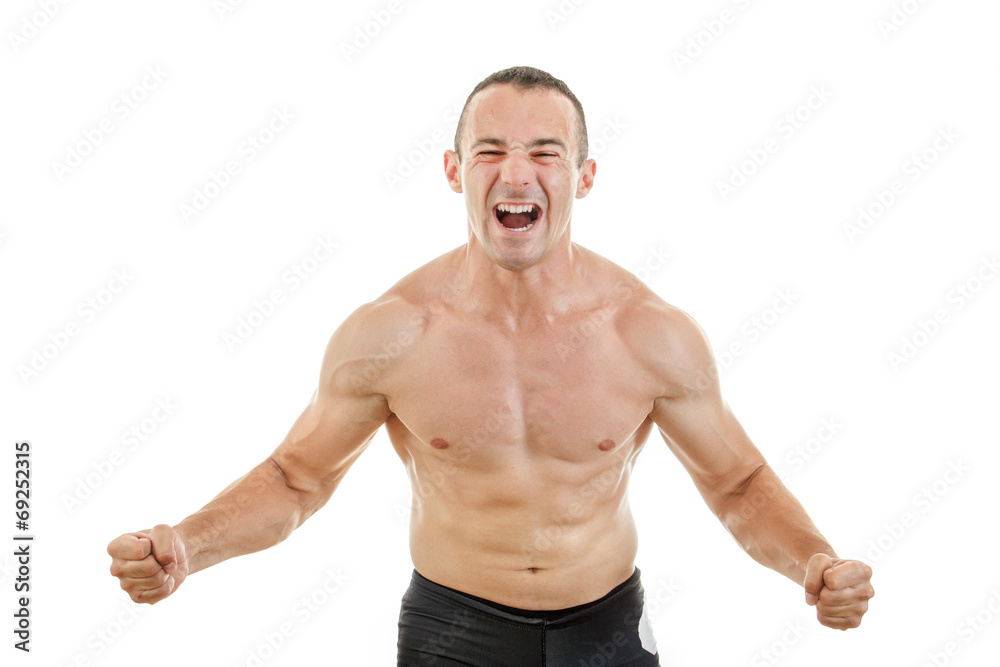 Muscular strong man fighter excited to win showing tighten muscl