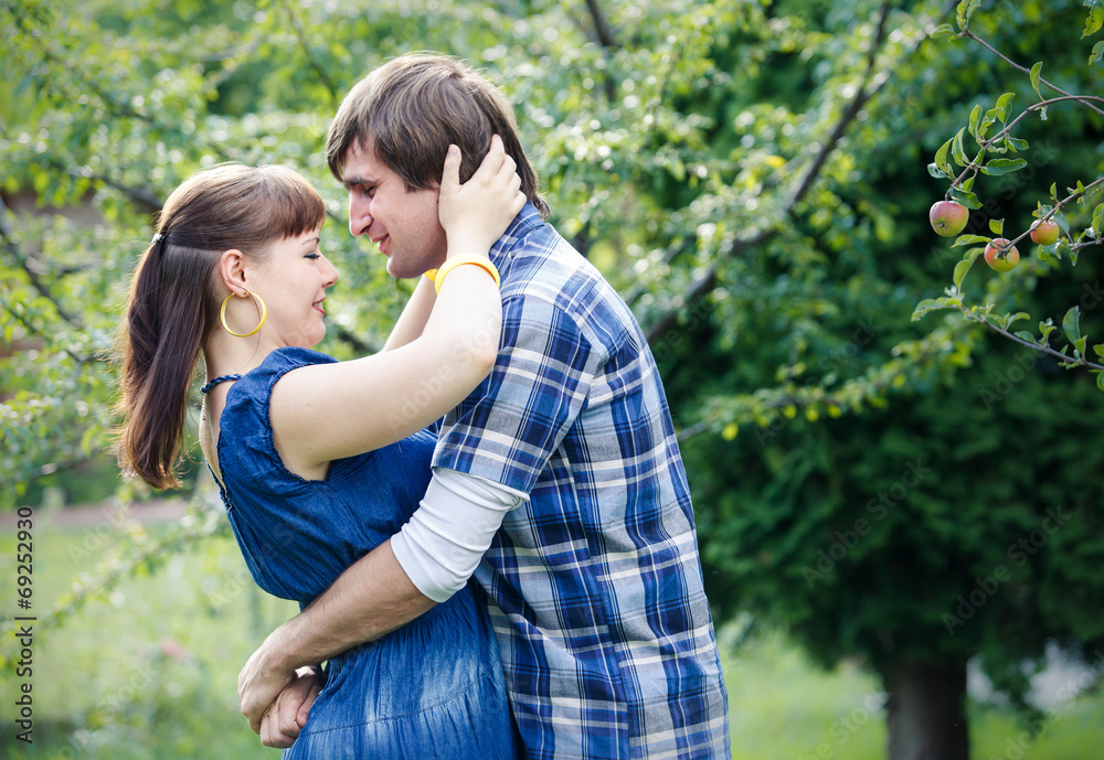 Fototapeta premium young couple in garden